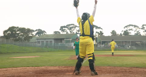 Female Baseball Player Celebrating Victory on the Field