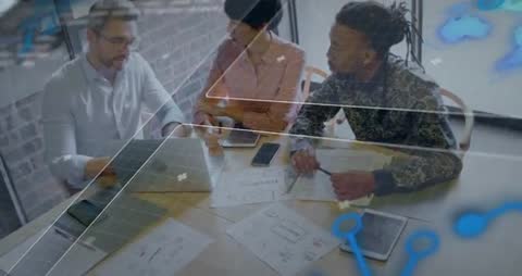 Innovative Business Team Analyzing Digital Data in Modern Workspace