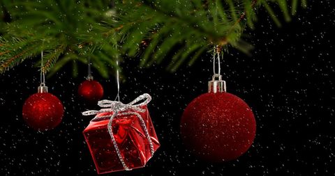 Festive Red Christmas Baubles and Gift Ornament in Snow - Download Free Stock Images Pikwizard.com