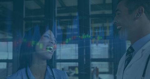 Business Professionals Laughing in Modern Office with Stock Data Overlay