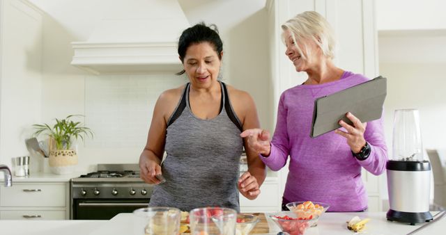 Healthy Living Coach Consulting in Kitchen with Blended Smoothies - Download Free Stock Images Pikwizard.com