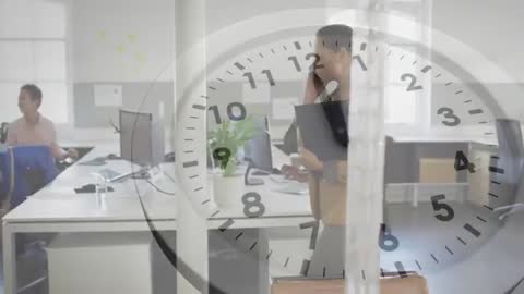 Business Professional in Busy Office with Time Management Concept