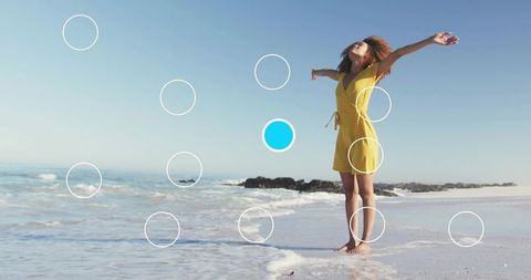 Joyful Woman Embracing Freedom at Ocean Beach