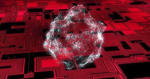 Neon glowing cybernetic particle orb hovering over red circuit grid casting cyan sparks