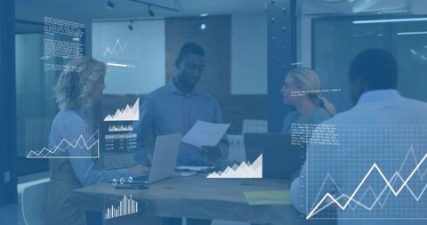 Presenting business team collaborating on data analytics and strategy in modern office