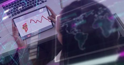 Woman holding tablet checking nft marketplace with falling red chart and holographic map