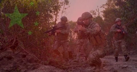 Kneeling Squad Leader Advancing Through Woodland at Dusk with Tactical Rifles, Camouflage