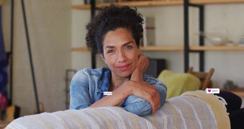 Woman Relaxing on Sofa in Cozy Minimalist Living Room