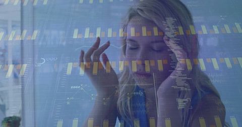 Businesswoman Analyzing Financial Data Insights in Office