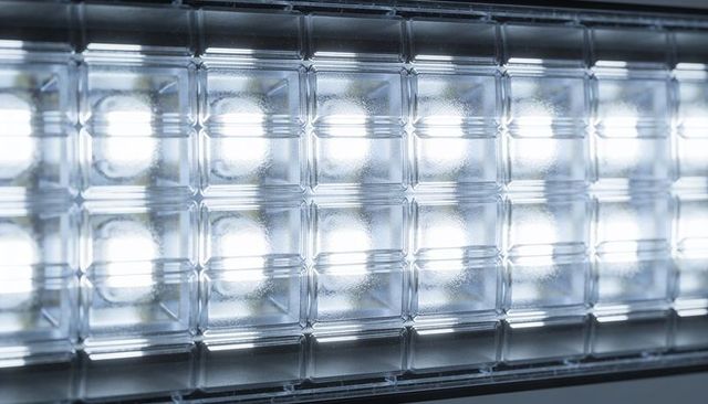 Cool white led panel with textured diffuser grid showing glowing rectangular led cells
