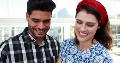 Joyful Young Couple Smiling in Bright Casual Atmosphere - Download Free Stock Images Pikwizard.com