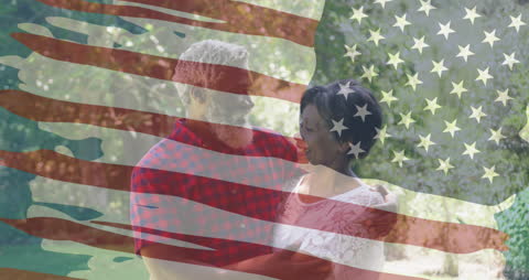 Couple Embracing Under American Flag Background