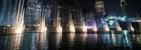 Dubai Fountain Night Show with Illuminated Skyscrapers