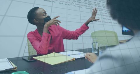 African American Businesswoman Analyzing Financial Trends Coronavirus Period