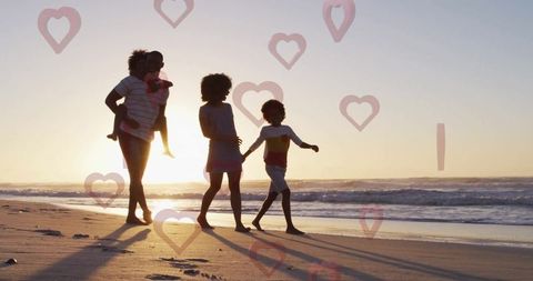 Family Bonding at Sunset Beach with Heart Overlays