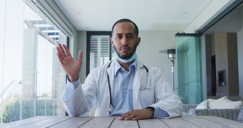 Doctor Communicating in Virtual Consultation