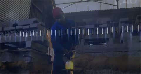 Foundry Worker Handling Molten Metal with High Precision