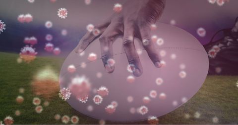 Rugby Ball Against Blurred Covid-19 Virus Cells - Download Free Stock Images Pikwizard.com