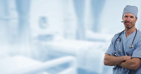 Confident doctor in blue scrubs with stethoscope, displaying expertise