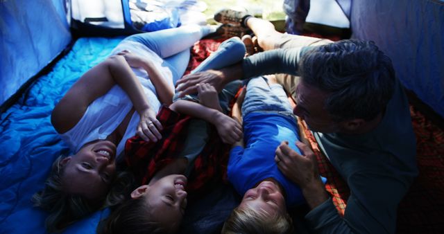 Family Bonding Inside Tent During Camping Trip - Download Free Stock Images Pikwizard.com