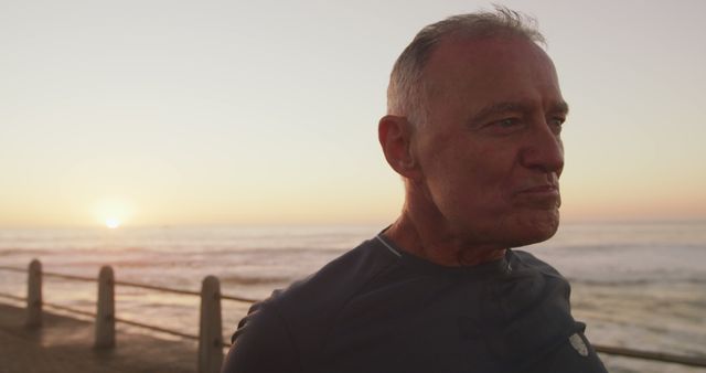 Senior Man Contemplating During Sunrise By Seaside - Download Free Stock Images Pikwizard.com