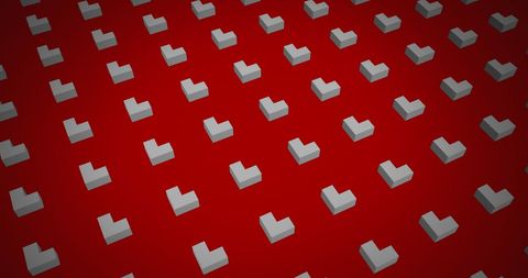 Abstract pattern of floating white blocks on red background