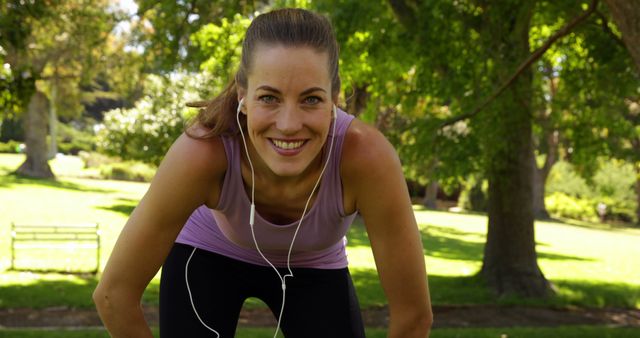 Smiling Woman Enjoying Outdoor Workout in Park - Download Free Stock Images Pikwizard.com