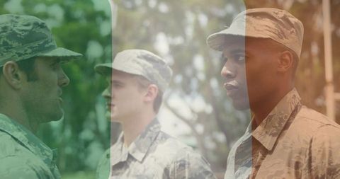 Three Soldiers Standing in Formation Wearing Camouflage Uniforms with Tricolor Overlay