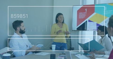 Businesswoman Leading Team Meeting with Data Visualization