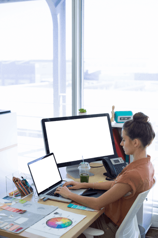 Transparent Office Workspace with Professional Woman Busy on Laptop - Download Free Stock Videos Pikwizard.com