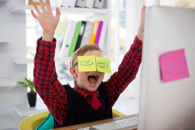Boy as business executive with sticky notes on his face in office