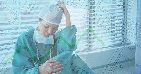 Stressed surgeon contemplates healthcare technology challenges