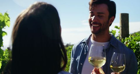Young Couple Enjoying White Wine at Vineyard Celebration - Download Free Stock Images Pikwizard.com