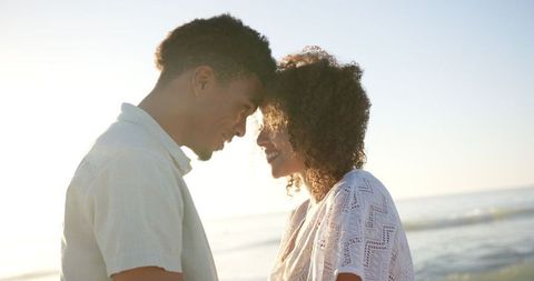 Romantic Couple Enjoying Sunset at the Beach