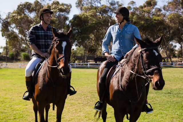 Two male friends riding horse in the ranch - Download Free Stock Photos Pikwizard.com