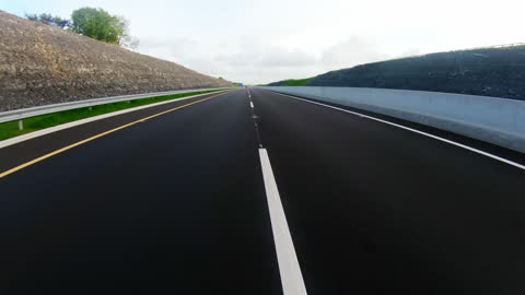 Fast Moving Vehicle on Open Country Highway