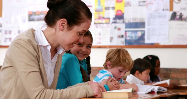 Teacher Engaging with Students in Classroom Setting - Download Free Stock Images Pikwizard.com