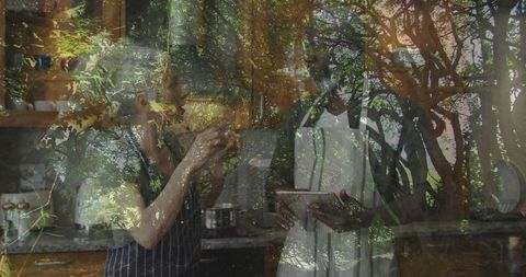 People Cooking with Tablet in Rustic Kitchen Setting