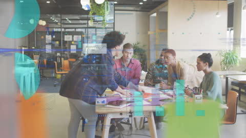 Diverse Business Team Analyzing Financial Data in Modern Office Space