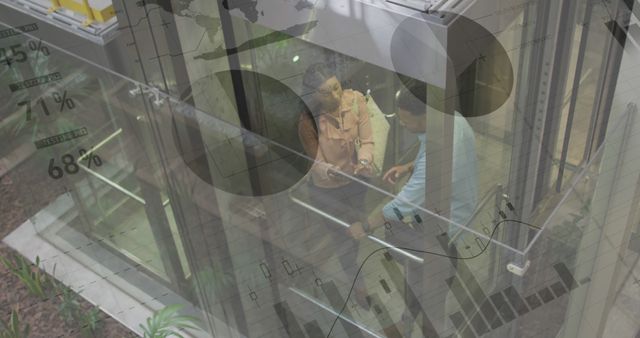 Business Professionals Analyzing Financial Data in Glass Elevator - Download Free Stock Images Pikwizard.com