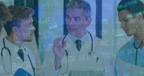 Healthcare Team Analyzing Financial Data in Medical Setting