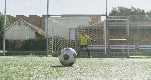 Young Soccer Goalie Practicing Defending The Goal - Download Free Stock Images Pikwizard.com