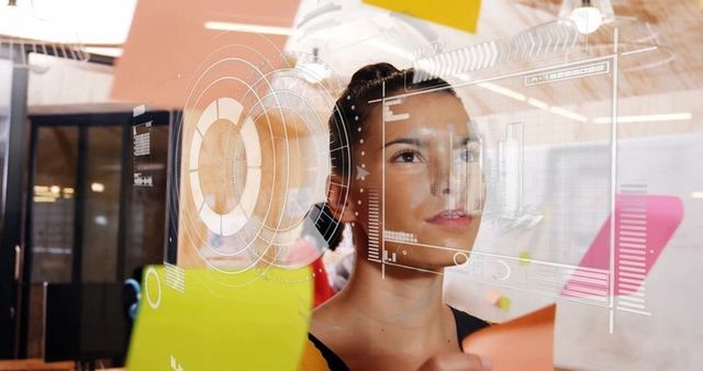 Businesswoman Engaging with Futuristic Interface in Modern Office