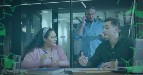 Team Collaborating on Project Ideas in Modern Office Environment