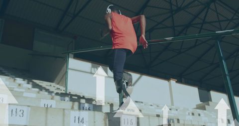 Determined african american male athlete with disability at stadium