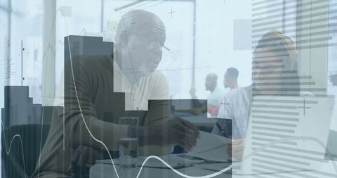 Business Professionals Analyzing Financial Reports in Modern Office - Download Free Stock Images Pikwizard.com