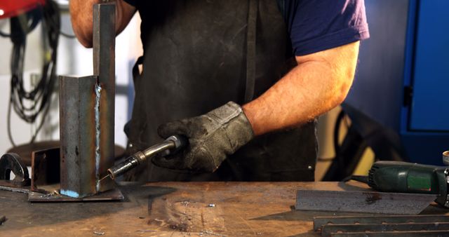 Welder Skillfully Welding Metal in Industrial Workshop - Download Free Stock Images Pikwizard.com