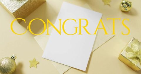 Celebration Concept with Congrats Card and Golden Gifts