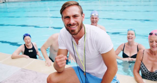 Swimming Instructor Teaching Senior Group Exercise at Pool - Download Free Stock Images Pikwizard.com