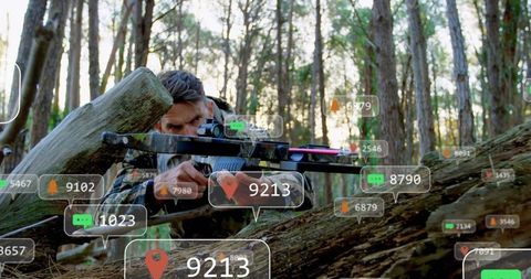 Soldier using augmented reality in forest environment